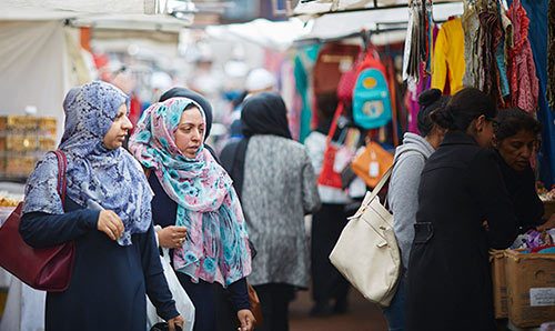 Muslim women shopping at Longsight market