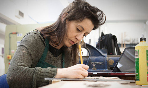 Woman at a workbench